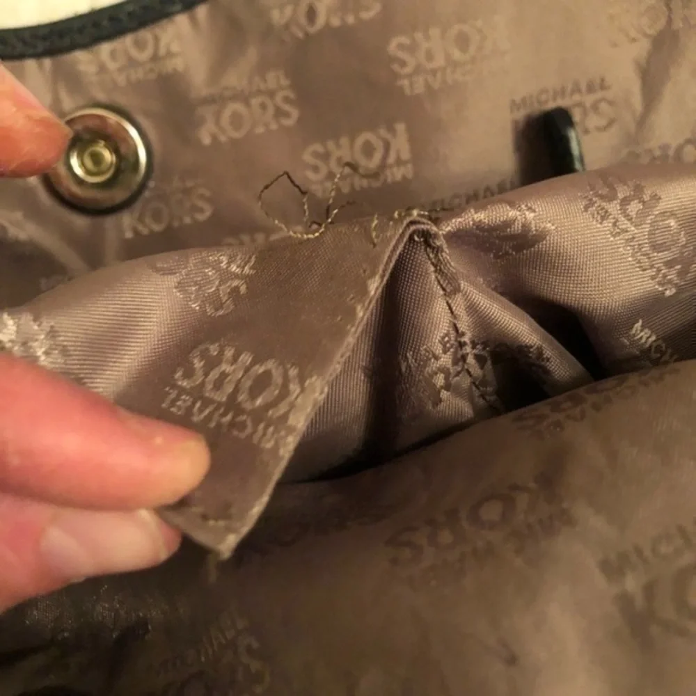 Michael kors brown monogram tote bag with blue leather trim